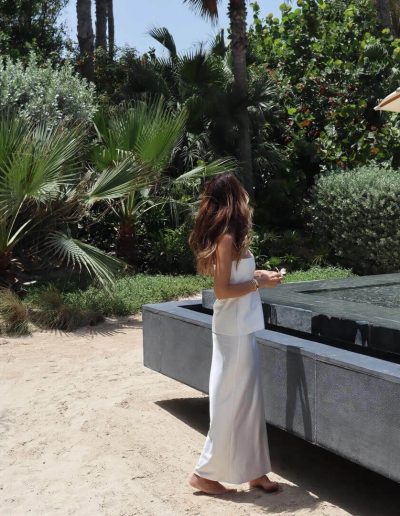 Fernanda Velez Posing while wearing Satin White top and skirt