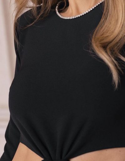 Fernanda Velez posing while wearing Knot Dress